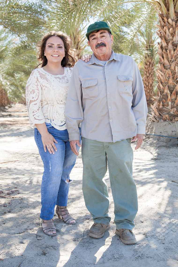 Maria and Simon Machuca photographed in a date orchard east of Mecca, Ca.